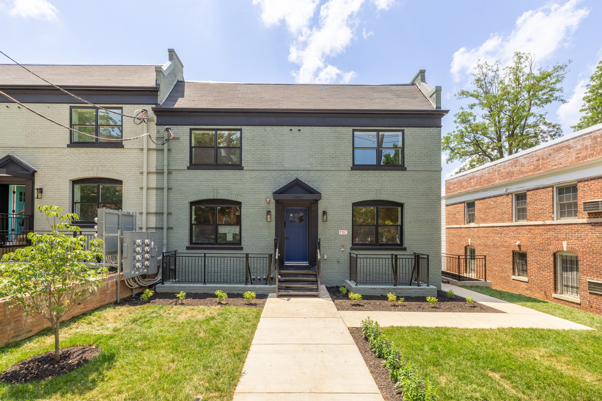 Sunny day at brick apartment complex
